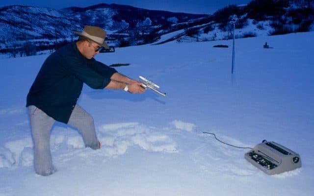 Eran Thomson Freelance Writer - Hunter S Thompson Shooting Typewriter in Snow Photo by Paul Chesley. Eran Thomson Writer
