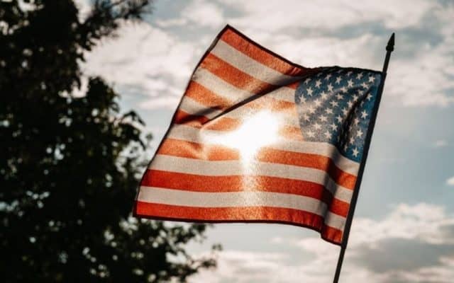 Eran Thomson, waving a flag doesn't make you a patriot, flag, American flag, patriotism, writer,